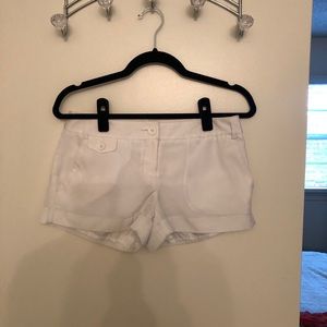 White polyester shorts